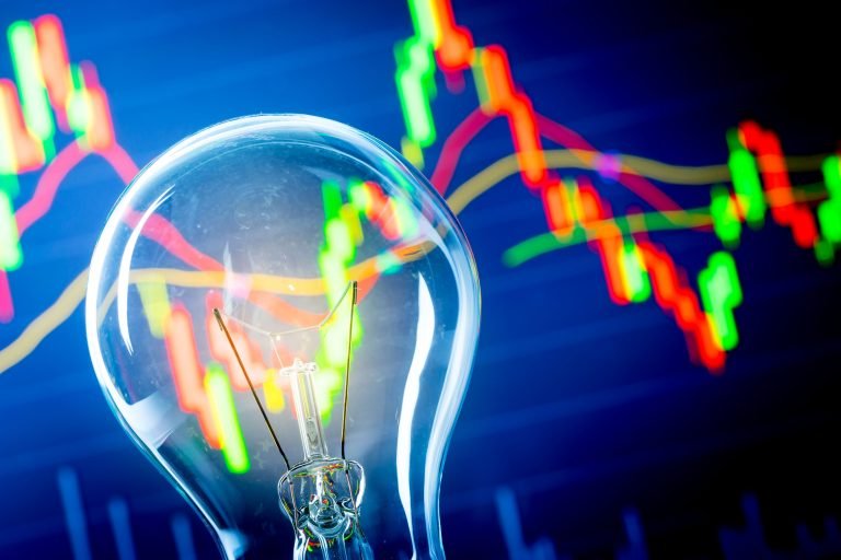 business success with stock graph and light bulb